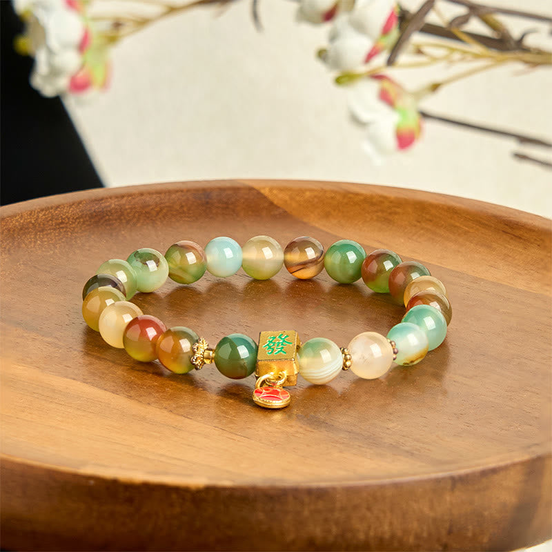 Pulsera de coraje con moneda de ágata pavo real natural de Buddha Stones