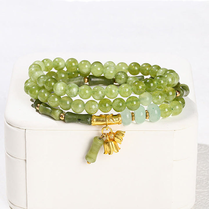 Pulsera de fuerza retro multicapa con Buddha Stones, lirio de los valles, bambú y calcedonia verde - image 3