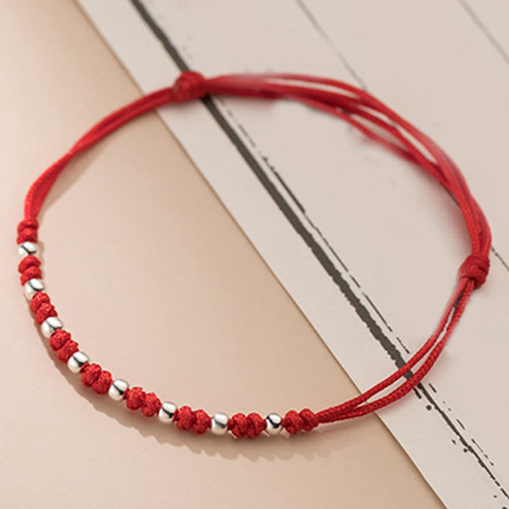 Pulsera de la suerte ajustable con cuentas de hilo rojo de plata de ley 925 y Buddha Stones - image 10