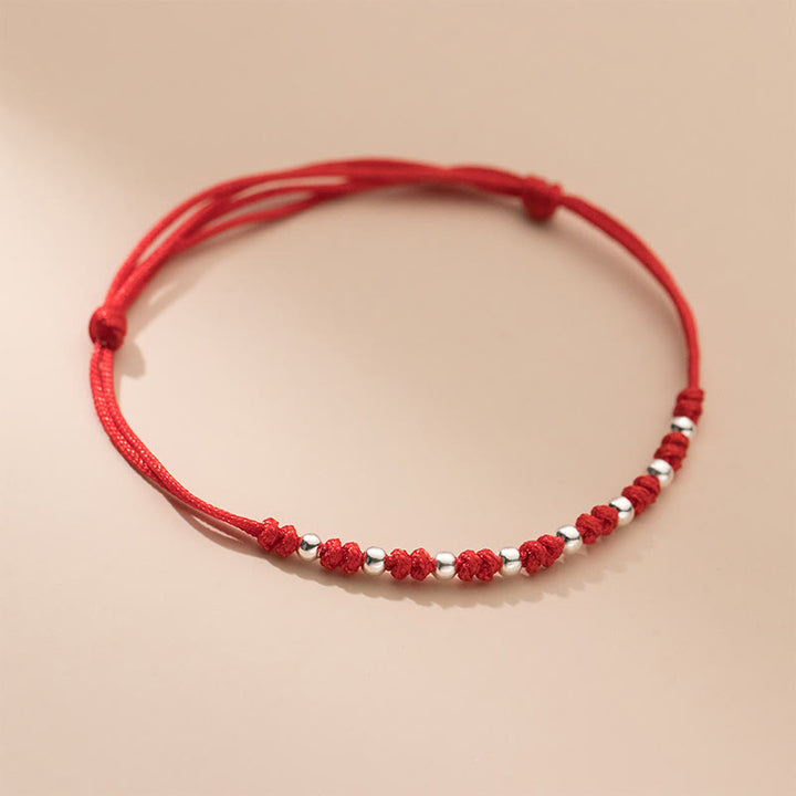 Pulsera de la suerte ajustable con cuentas de hilo rojo de plata de ley 925 y Buddha Stones - image 8