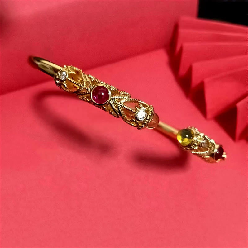 Brazalete de la suerte con Buddha Stones, diseño de flores doradas, circonita roja, ámbar y cobre - image 9