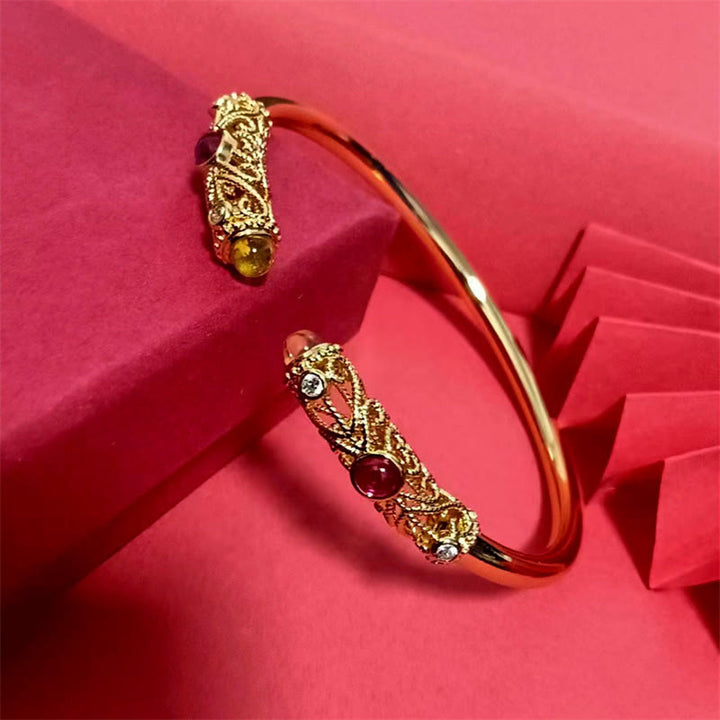 Brazalete de la suerte con Buddha Stones, diseño de flores doradas, circonita roja, ámbar y cobre - image 8