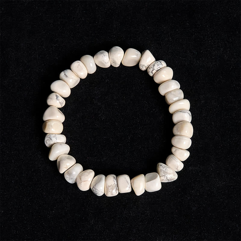 Pulsera de coraje con bloques irregulares de turquesa blanca y Buddha Stones