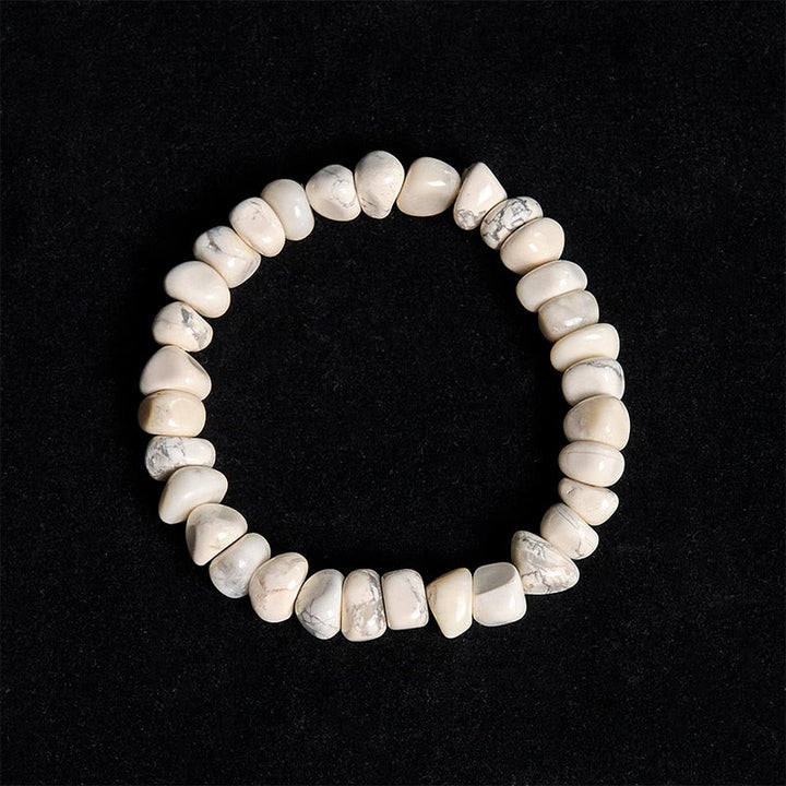 Pulsera de coraje con bloques irregulares de turquesa blanca y Buddha Stones