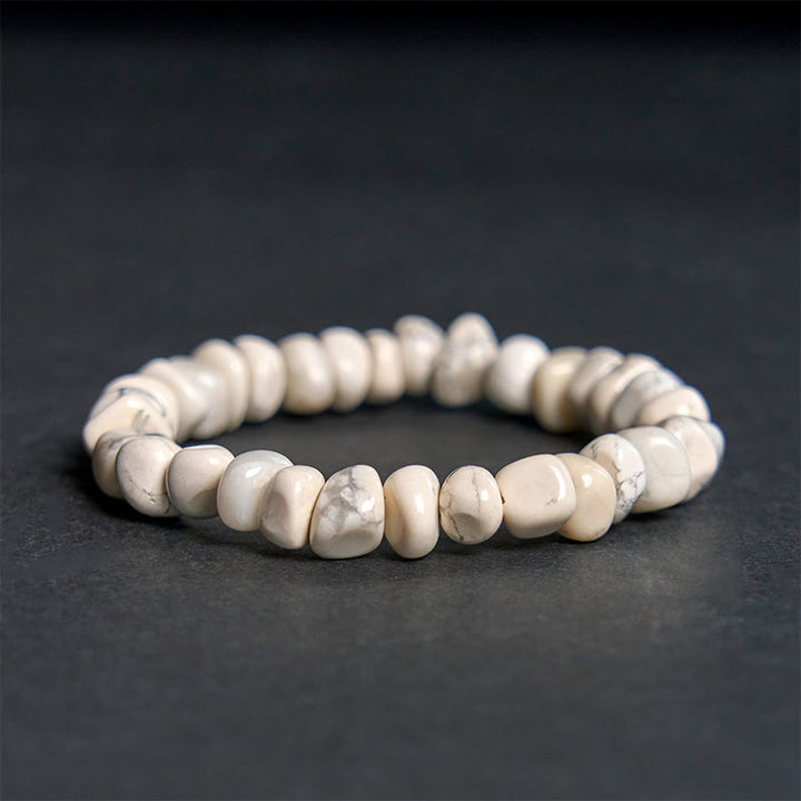 Pulsera de coraje con bloques irregulares de turquesa blanca y Buddha Stones