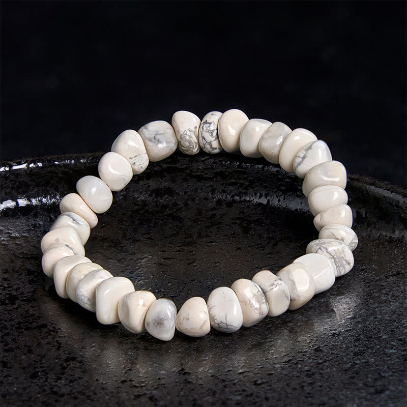 Pulsera de coraje con bloques irregulares de turquesa blanca y Buddha Stones