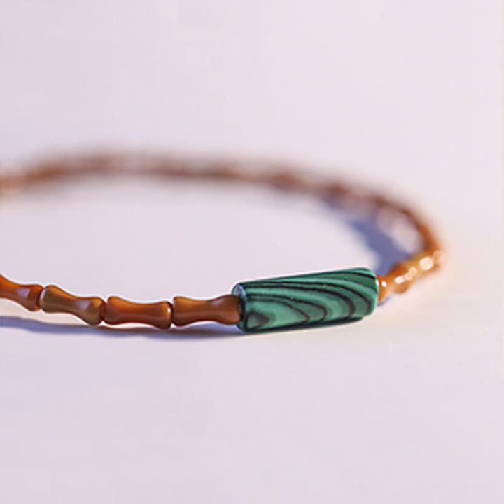 Pulsera de la paz de hueso de oliva ultrafino de Buddha Stones - image 11