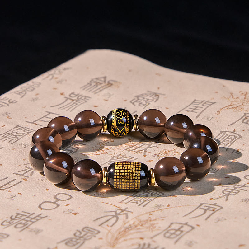 Pulsera de coraje en sánscrito con obsidiana de hielo y Buddha Stones con sello dorado