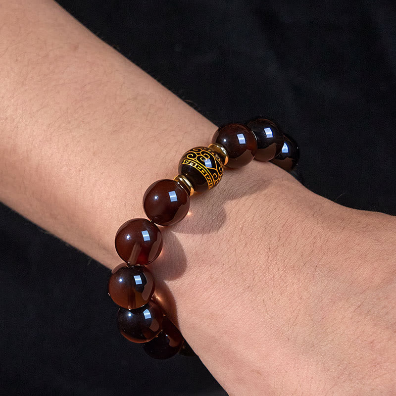 Pulsera de coraje en sánscrito con obsidiana de hielo y Buddha Stones con sello dorado
