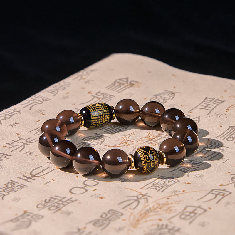 Pulsera de coraje en sánscrito con obsidiana de hielo y Buddha Stones con sello dorado