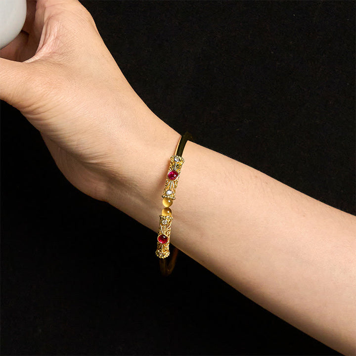 Brazalete de la suerte con Buddha Stones, diseño de flores doradas, circonita roja, ámbar y cobre - image 13