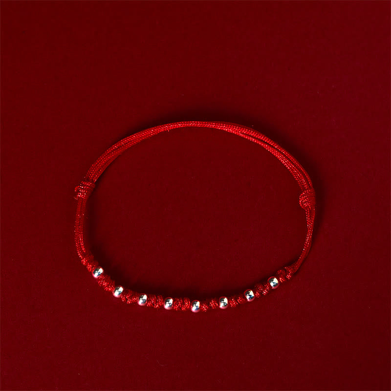 Pulsera de la suerte ajustable con cuentas de hilo rojo de plata de ley 925 y Buddha Stones - image 1