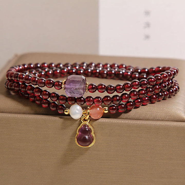 Pulsera multicapa de protección de calabaza, amatista y granate natural de Buddha Stones - Granate (circunferencia de la muñeca: 14-15 cm) - image 1
