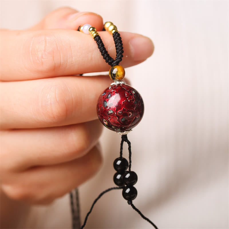 Collar con colgante de paz, con cuentas de Venus Aurora, madera de ébano y Buddha Stones lacadas - Charm rojo (rojo aleatorio) - image 1