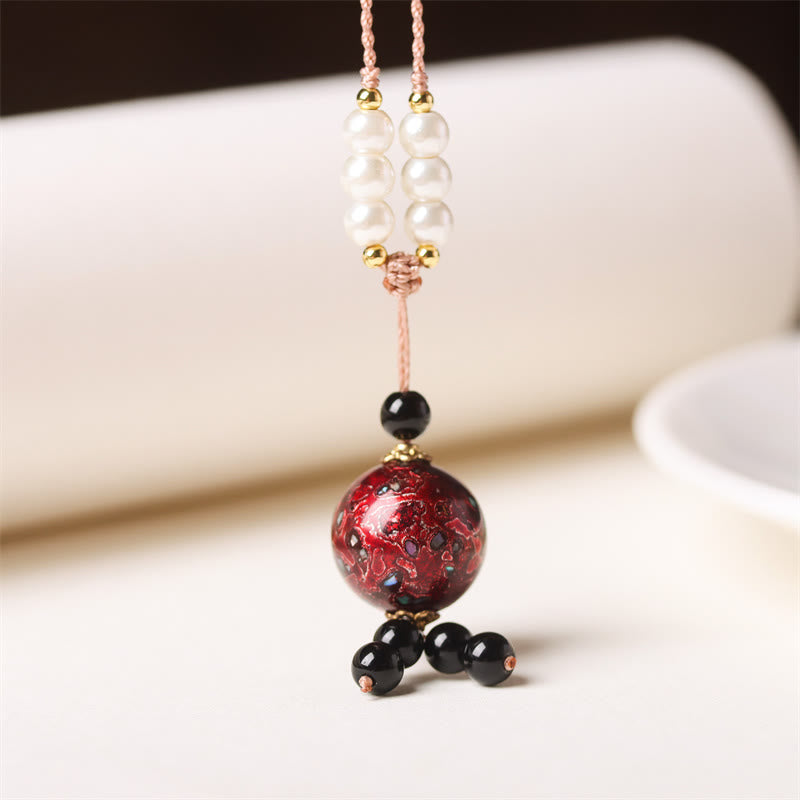 Collar con colgante de equilibrio de perlas y cuentas artesanales de madera de ébano y laca Aurora con Buddha Stones - Charm rojo oscuro (rojo aleatorio) - image 1
