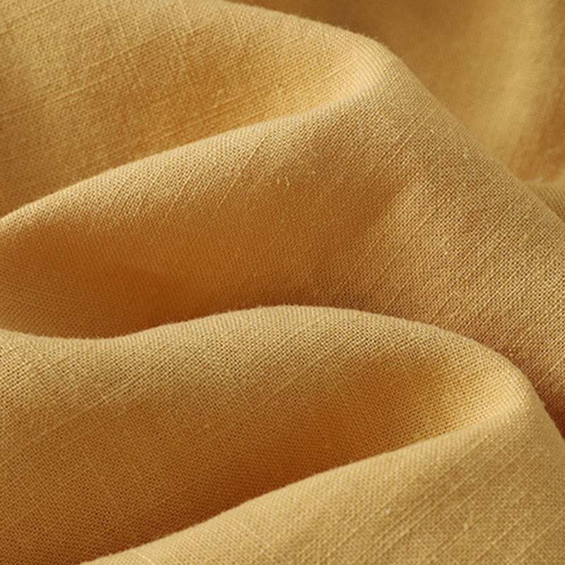 Camisa de lino y algodón con botones inclinados y diseño de Buddha Stones para mujer - image 1