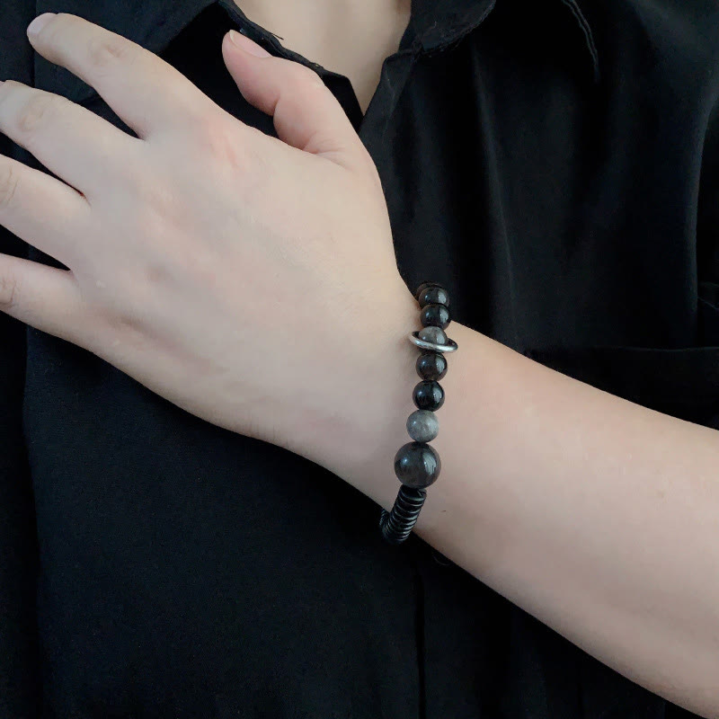 Pulsera protectora de concha de coco y obsidiana con brillo plateado de Buddha Stones - image 10