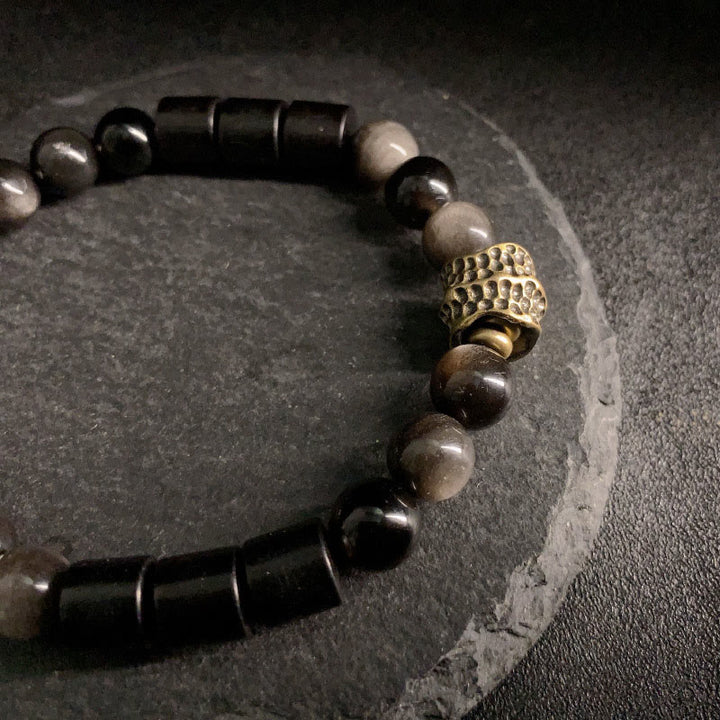 Pulsera protectora de obsidiana y ébano con brillo plateado de Buddha Stones - image 7