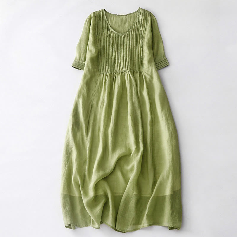Vestido midi informal de manga corta con cuello en V, pliegues tipo acordeón y bolsillos, con estampado de Buddha Stones. - image 9