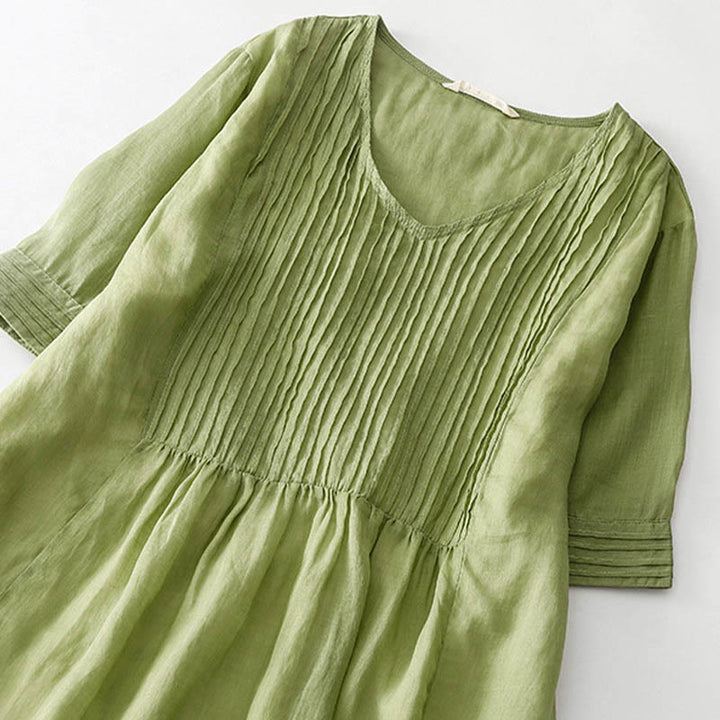 Vestido midi informal de manga corta con cuello en V, pliegues tipo acordeón y bolsillos, con estampado de Buddha Stones. - image 12