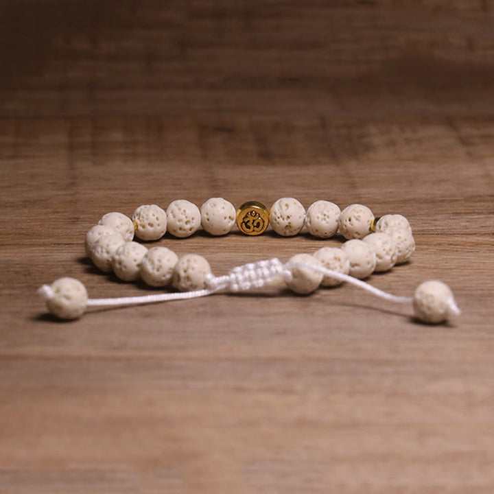 Pulsera de piedra de lava blanca con símbolo Om y Buddha Stones para la calma y la curación - image 2