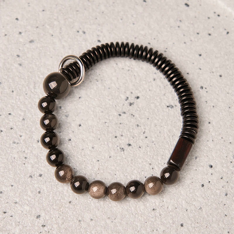 Pulsera protectora de concha de coco y obsidiana con brillo plateado de Buddha Stones - image 2