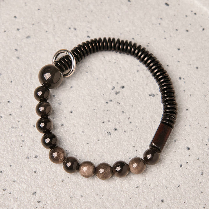 Pulsera protectora de concha de coco y obsidiana con brillo plateado de Buddha Stones - image 2