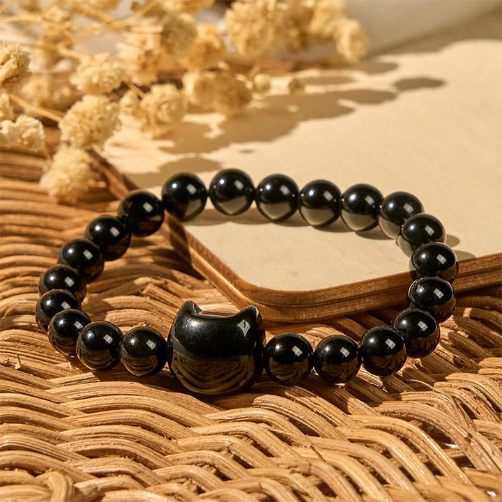 Pulsera de protección de ónix negro natural con Buddha Stones y gato negro - image 2