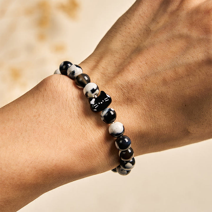 Pulsera de confianza de ágata de fuego de gato blanca y negra con Buddha Stones - image 4