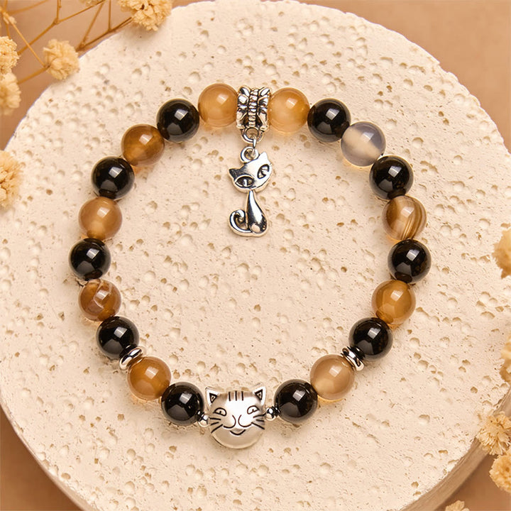 Pulsera protectora de ónix negro y ágata rayada marrón claro con diseño de gato carey y Buddha Stones - image 2