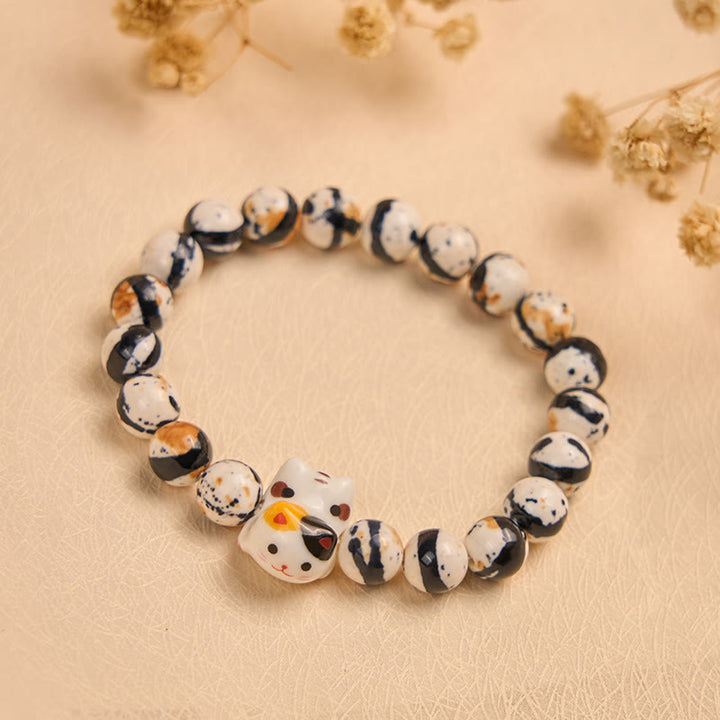 Pulsera de fuerza con cabeza de gatito de cerámica y piedra natural de gato calicó de Buddha Stones - image 4