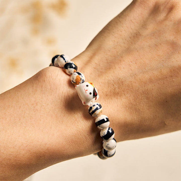 Pulsera de fuerza con cabeza de gatito de cerámica y piedra natural de gato calicó de Buddha Stones - image 5