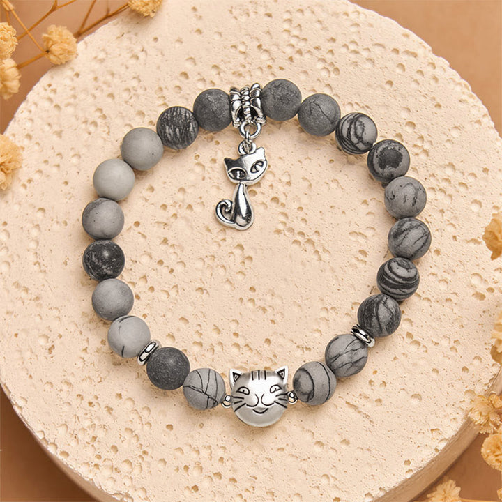 Pulsera de jaspe veteado negro natural con diseño de gato atigrado gris de Buddha Stones - image 1