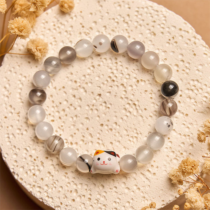 Pulsera de poder con cabeza de gatito de cerámica y piedra de ágata natural de Buddha Stones y gato calicó - image 2
