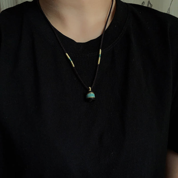 Collar con colgante de paz con cilindro de turquesa y madera de ébano con Buddha Stones - image 7