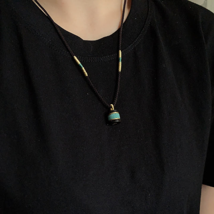 Collar con colgante de paz con cilindro de turquesa y madera de ébano con Buddha Stones - image 8