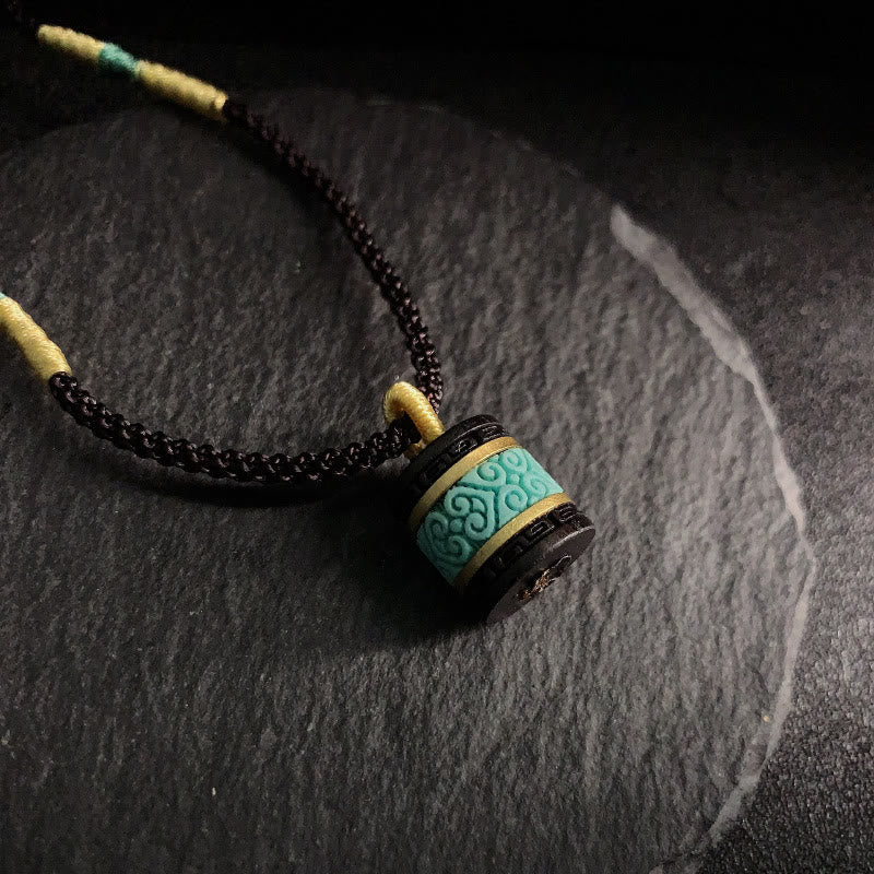 Collar con colgante de paz con cilindro de turquesa y madera de ébano con Buddha Stones - Madera de ébano - image 1