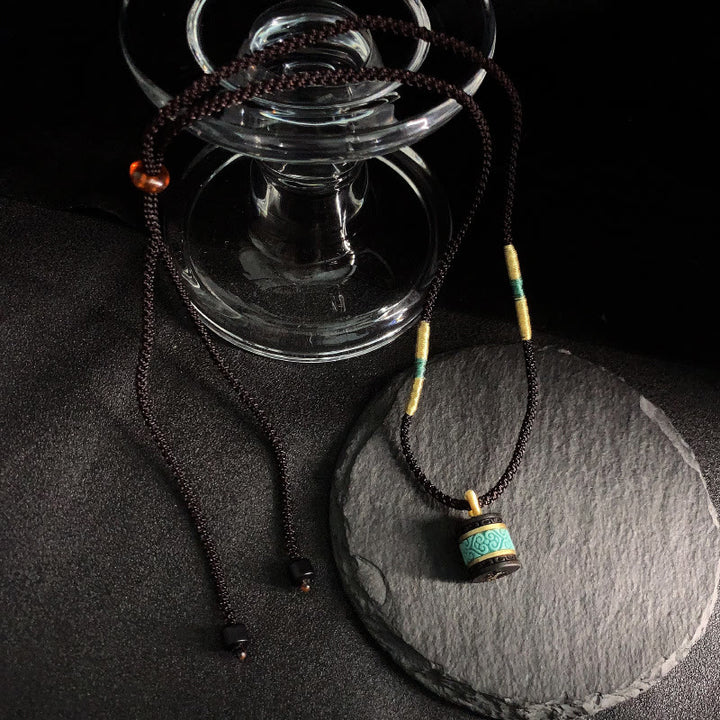 Collar con colgante de paz con cilindro de turquesa y madera de ébano con Buddha Stones - image 3