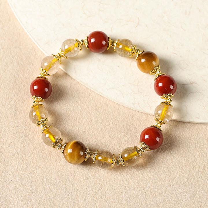 Pulsera de la riqueza con cuentas de ojo de tigre y cuarzo rutilado dorado natural de Buddha Stones - image 1
