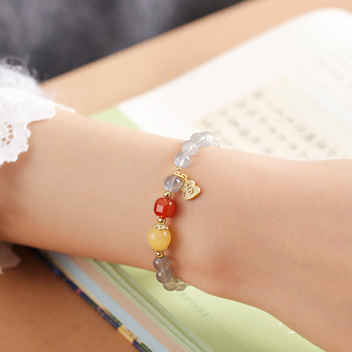 Pulsera con encanto de loto, piedra lunar natural y Buddha Stones - image 13