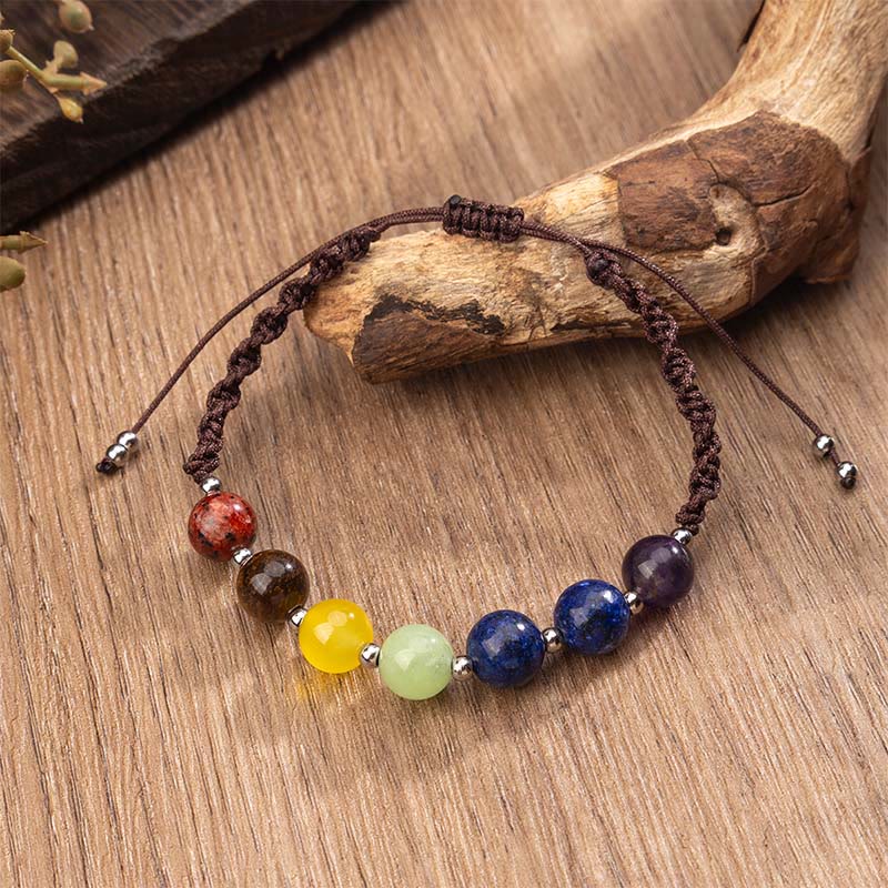Pulsera de cuerda con Buddha Stones, cristales naturales variados, ojo de tigre y amatista. - Cuerda marrón y varios cristales (circunferencia de la muñeca: 15-26 cm) - image 0