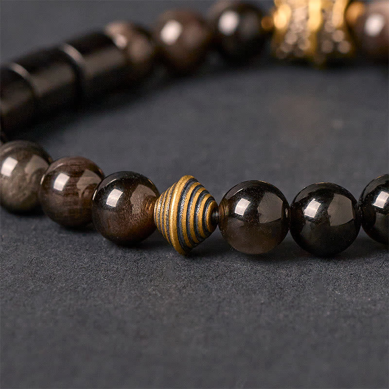 Pulsera protectora de obsidiana y ébano con brillo plateado de Buddha Stones - image 3