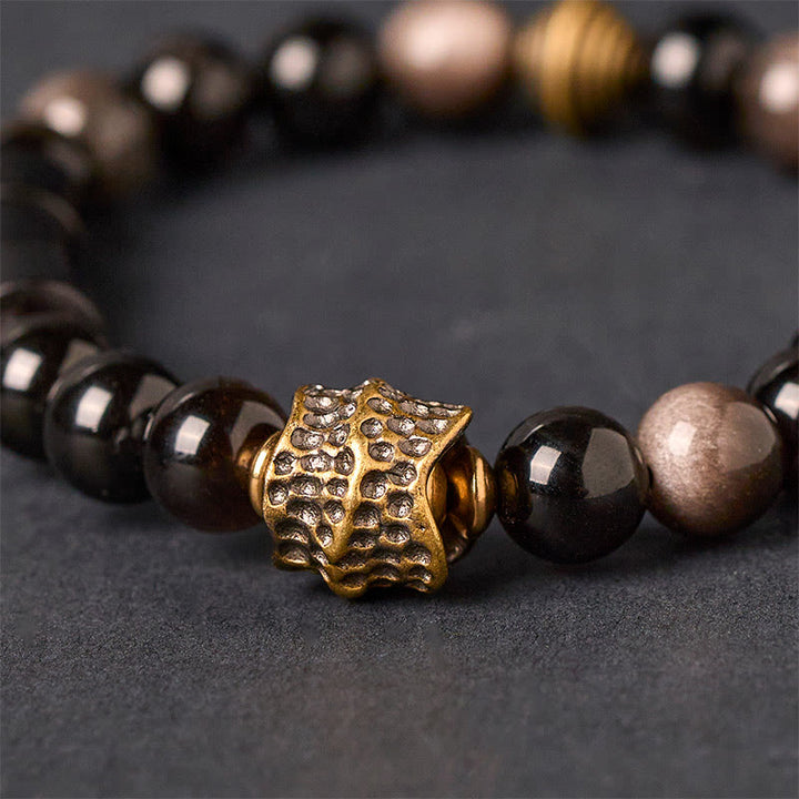 Pulsera protectora de obsidiana y ébano con brillo plateado de Buddha Stones - image 2