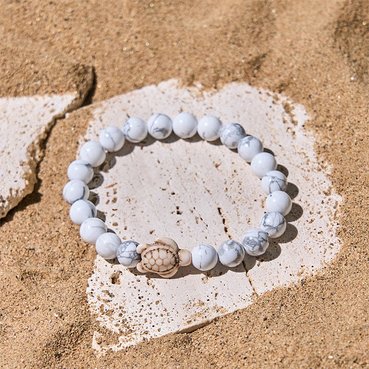 Pulsera de la sabiduría de ágata craquelada turquesa y tortuga marina de piedra natural de Buddha Stones - image 9