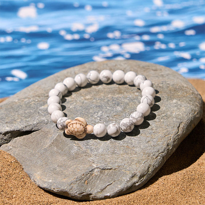 Pulsera de la sabiduría de ágata craquelada turquesa y tortuga marina de piedra natural de Buddha Stones - image 10