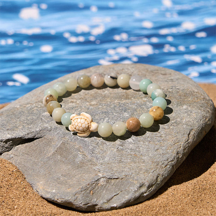 Pulsera de la sabiduría de ágata craquelada turquesa y tortuga marina de piedra natural de Buddha Stones - image 14