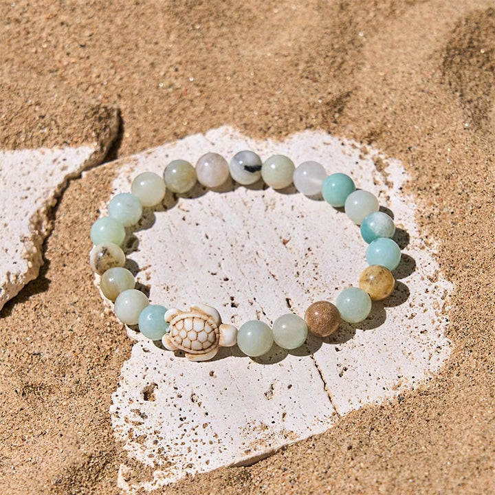 Pulsera de la sabiduría de ágata craquelada turquesa y tortuga marina de piedra natural de Buddha Stones - image 13