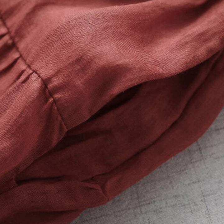 Vestido midi con bolsillos, mangas abullonadas y bordado de Buddha Stones - image 8