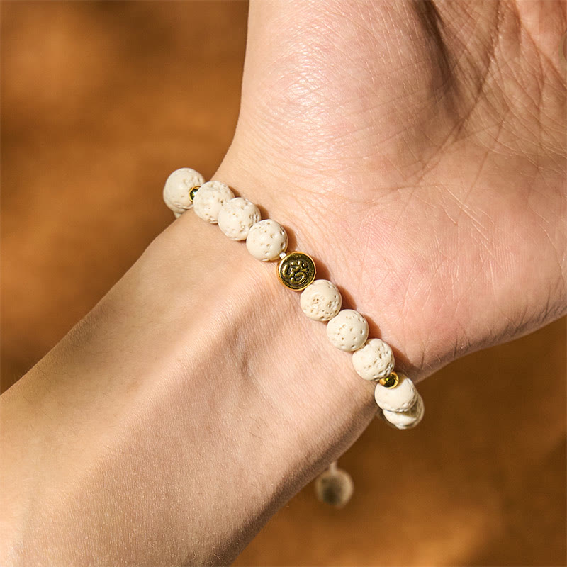 Pulsera de piedra de lava blanca con símbolo Om y Buddha Stones para la calma y la curación - image 4