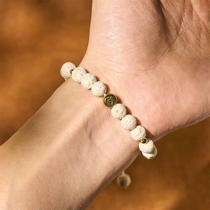 Pulsera de piedra de lava blanca con símbolo Om y Buddha Stones para la calma y la curación - image 4
